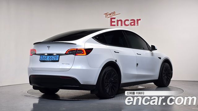 2022 Tesla Model Y, VIN 7SAYGDEE0NF567590