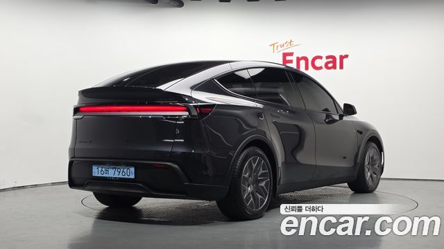 2026 Tesla Model Y, VIN LRWYGCEK6TC686037