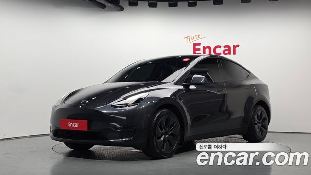 2024 Tesla Model Y, VIN LRWYGCEK5RC641342