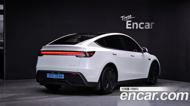 2025 Tesla Model Y, VIN LRWYGCEK5SC052023