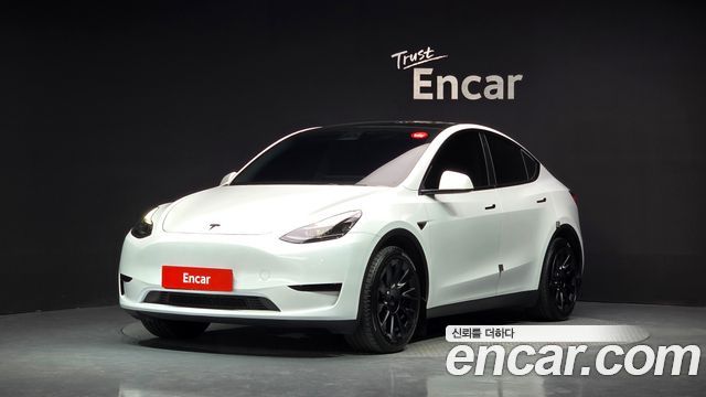 2024 Tesla Model Y, VIN LRWYGCFSXRC425968