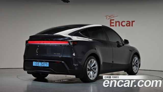 2025 Tesla Model Y, VIN LRWYGCEK4SC077916