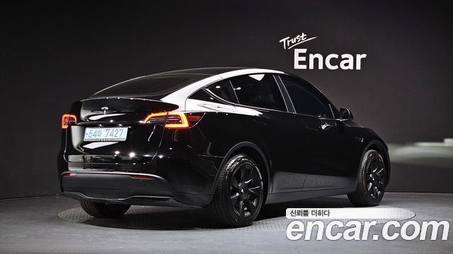 2024 Tesla Model Y, VIN LRWYGCFS3RC130503