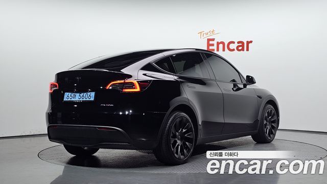 2023 Tesla Model Y, VIN 7SAYGDEE3PF641068