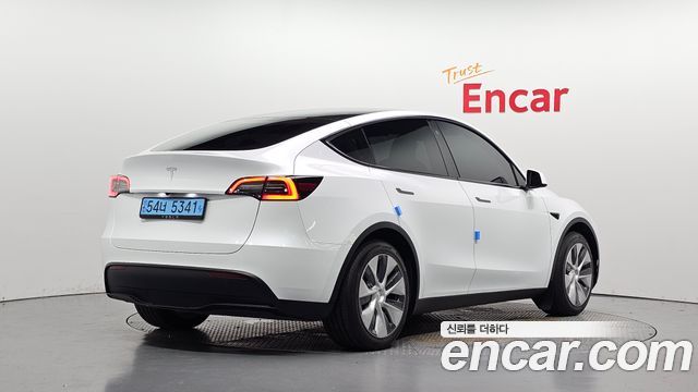 2024 Tesla Model Y, VIN LRWYGCFSXRC189483