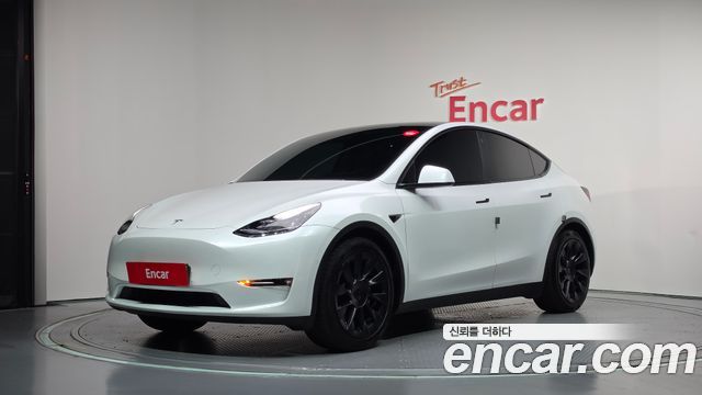 2021 Tesla Model Y, VIN 5YJYGDED1MF237976