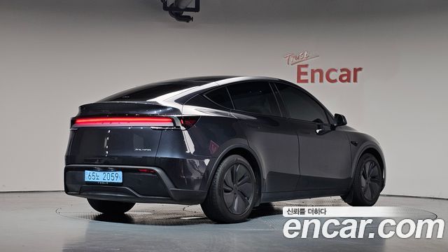 2025 Tesla Model Y, VIN LRWYGCEK9SC086367