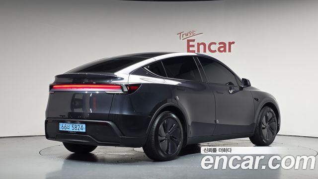 2025 Tesla Model Y, VIN LRWYGCFJ7SC047055