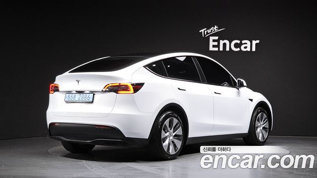 2023 Tesla Model Y, VIN LRWYGCFS7PC103219