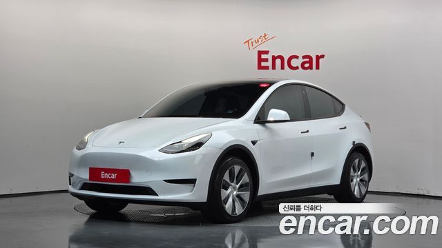 2023 Tesla Model Y, VIN LRWYGCFS4PC130118