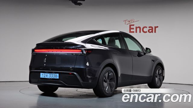 2026 Tesla Model Y, VIN LRWYGCEK9TC910384