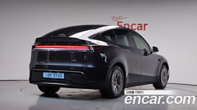 2026 Tesla Model Y, VIN LRWYGCEK8TC687383