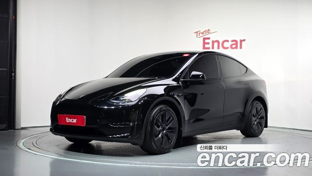 2024 Tesla Model Y, VIN LRWYGCEK0RC615716