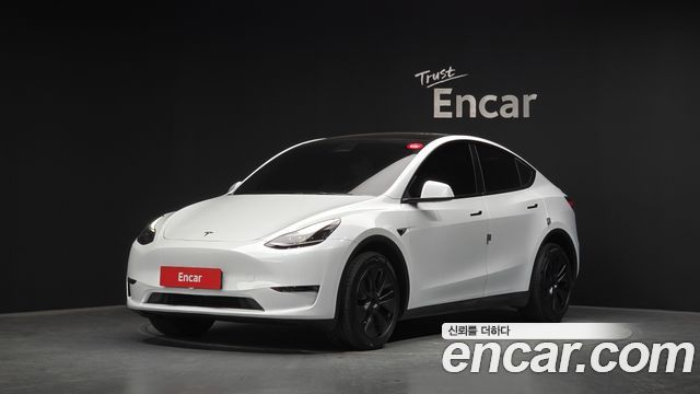 2024 Tesla Model Y, VIN LRWYGCEK0RC700278