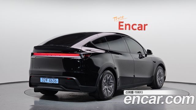 2026 Tesla Model Y, VIN LRWYGCEK9TC718303