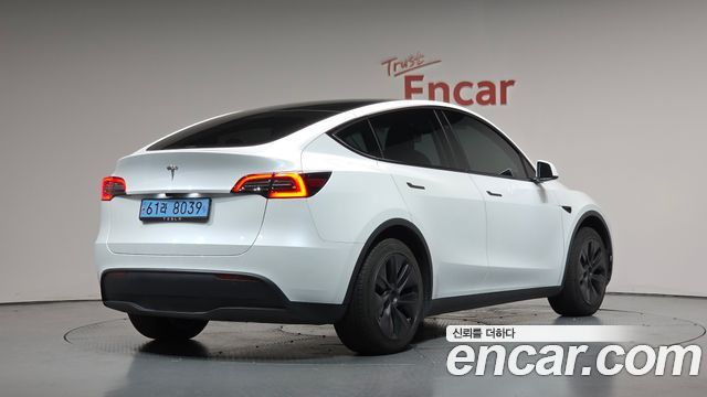 2024 Tesla Model Y, VIN LRWYGCFS9RC799035