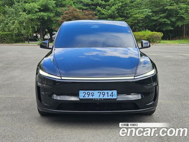 2025 Tesla Model Y, VIN LRWYGCEK1SC299605