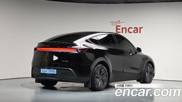 2026 Tesla Model Y, VIN LRWYGCEK5TC565581
