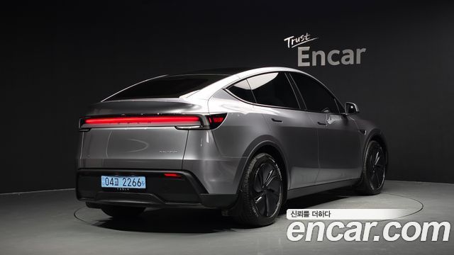 2025 Tesla Model Y, VIN LRWYGCEK8SC299472