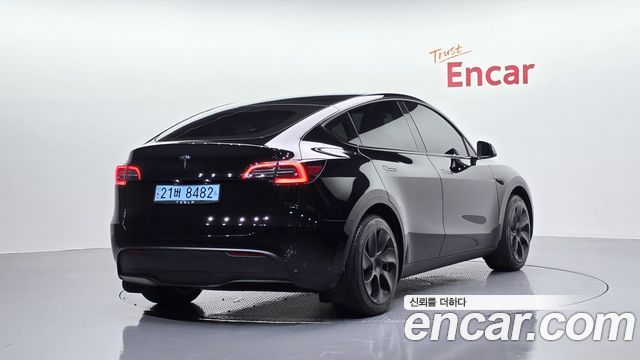 2023 Tesla Model Y, VIN LRWYGCFS0PC103840