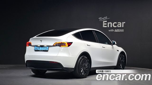 2023 Tesla Model Y, VIN 7SAYGDEE1PF641618