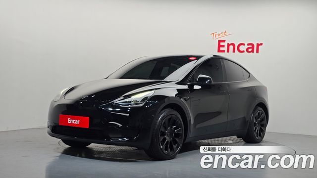 2023 Tesla Model Y, VIN LRWYGCFS0PC130407