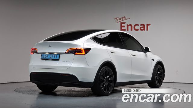 2021 Tesla Model Y, VIN 5YJYGDEE5MF168296