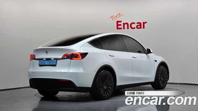 2024 Tesla Model Y, VIN LRWYGCFS5RC426008