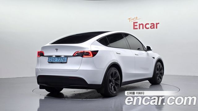 2023 Tesla Model Y, VIN LRWYGCFS4PC103100