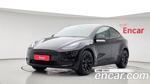 2024 Tesla Model Y, VIN LRWYGCEK7RC495963