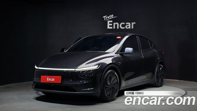 2025 Tesla Model Y, VIN LRWYGCEK9SC052235