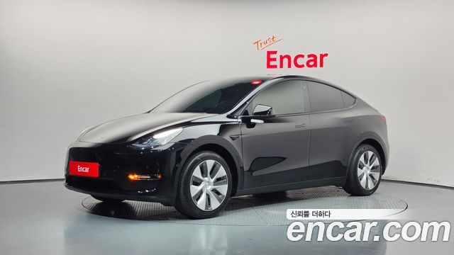 2021 Tesla Model Y, VIN 5YJYGDED9MF239023