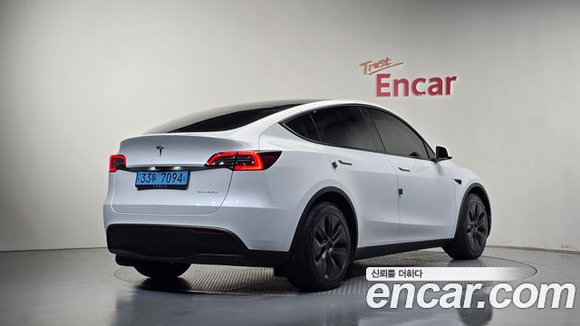 2024 Tesla Model Y, VIN LRWYGCEK7RC800734
