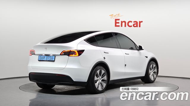 2024 Tesla Model Y, VIN LRWYGCFSXRC416154