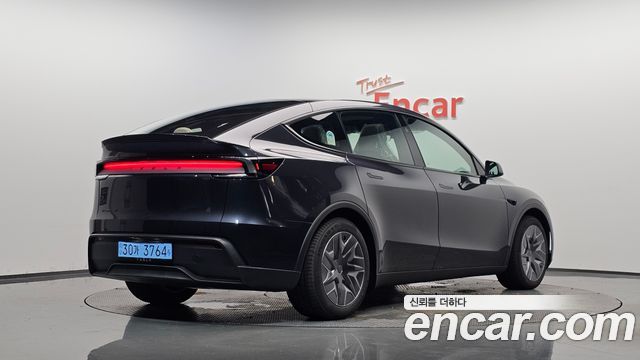2026 Tesla Model Y, VIN LRWYGCEK6TC871382