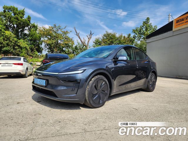2025 Tesla Model Y, VIN LRWYGCEK9SC201520