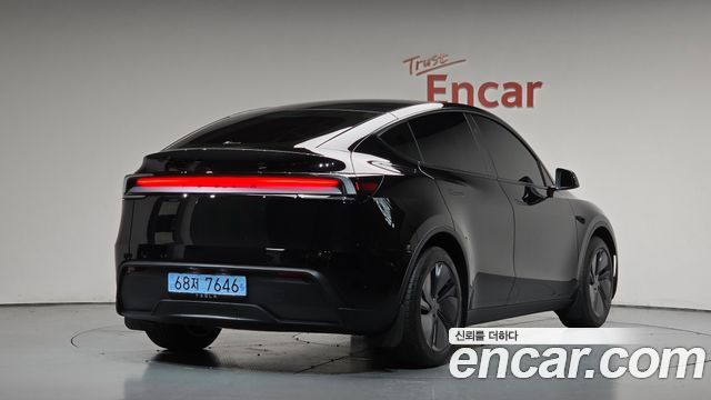 2025 Tesla Model Y, VIN LRWYGCFJ9SC313546