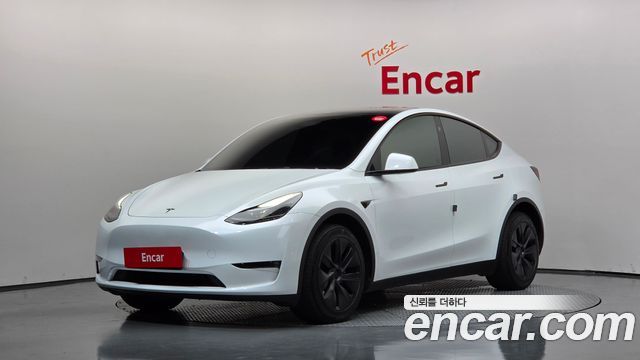 2024 Tesla Model Y, VIN LRWYGCEKXRC615478