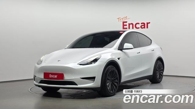 2023 Tesla Model Y, VIN LRWYGCFS1PC104009