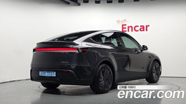 2026 Tesla Model Y, VIN LRWYGCEK8TC551304
