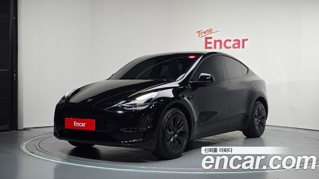 2024 Tesla Model Y, VIN LRWYGCEKXRC641269
