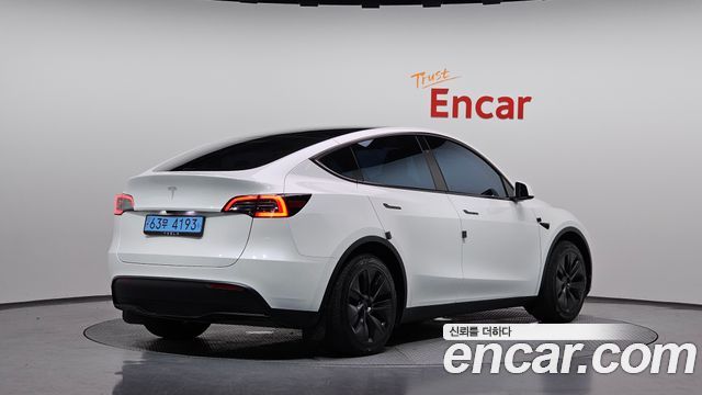 2024 Tesla Model Y, VIN LRWYGCFS4RC552604