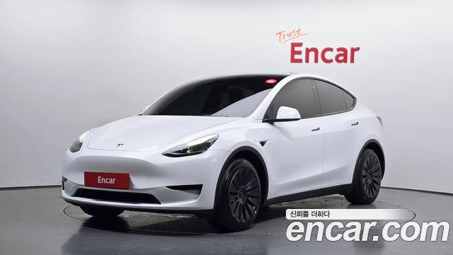 2023 Tesla Model Y, VIN LRWYGCFS4PC130670
