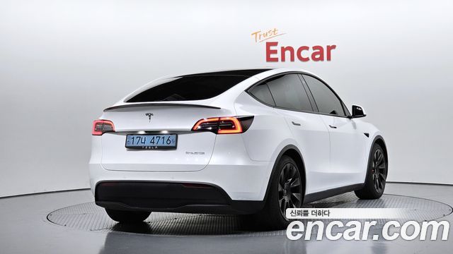 2021 Tesla Model Y, VIN 5YJYGDEF7MF167143