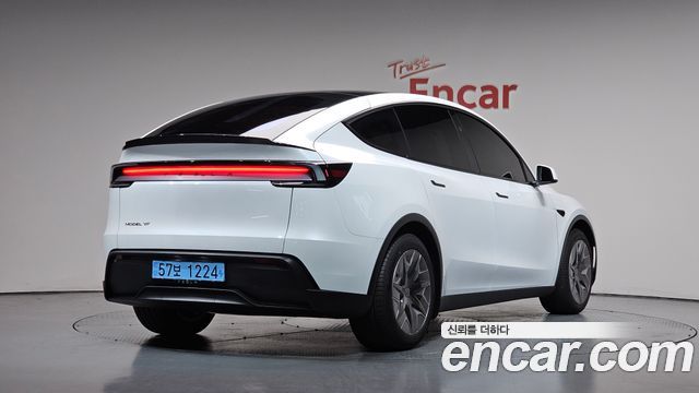 2026 Tesla Model Y, VIN LRWYGCEK7TC926499