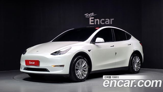 2021 Tesla Model Y, VIN 5YJYGDED9MF238535