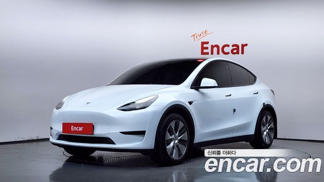 2024 Tesla Model Y, VIN LRWYGCFS7RC160023