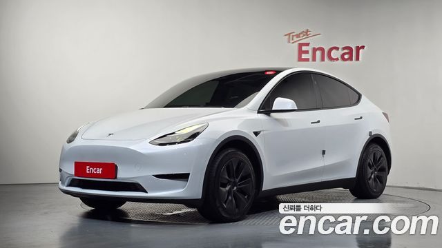 2024 Tesla Model Y, VIN LRWYGCFS9RC563128