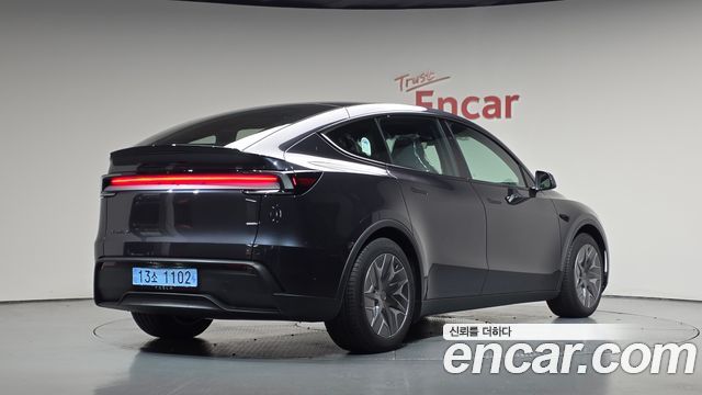 2026 Tesla Model Y, VIN LRWYGCEK0TC910550
