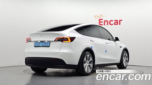 2024 Tesla Model Y, VIN LRWYGCFS9RC418980